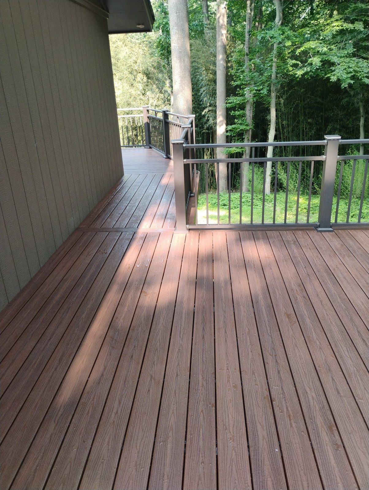 Completed composite deck with black railing