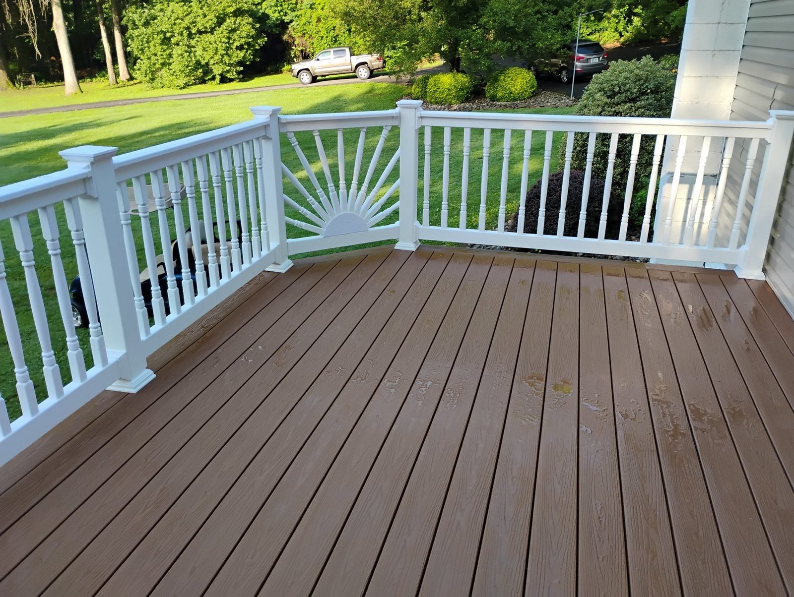 Completed deck with white vinyl railing