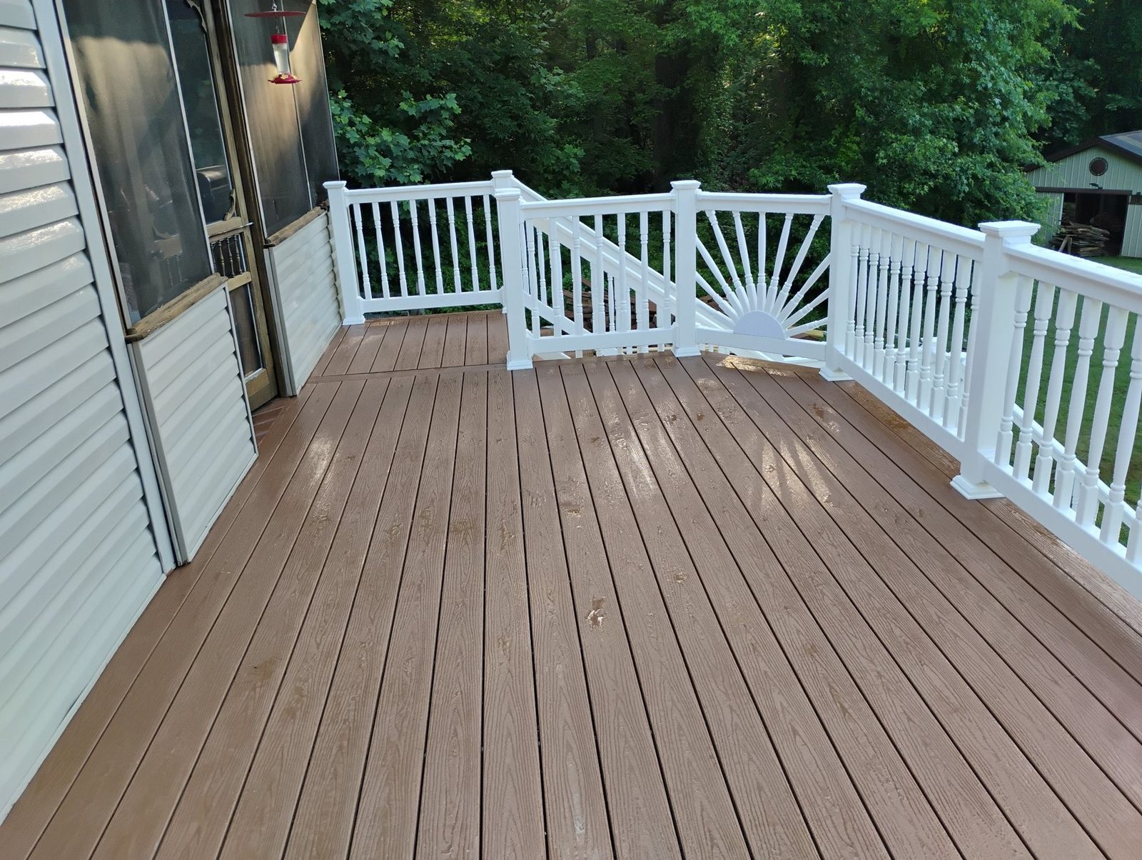 Completed deck with white railings