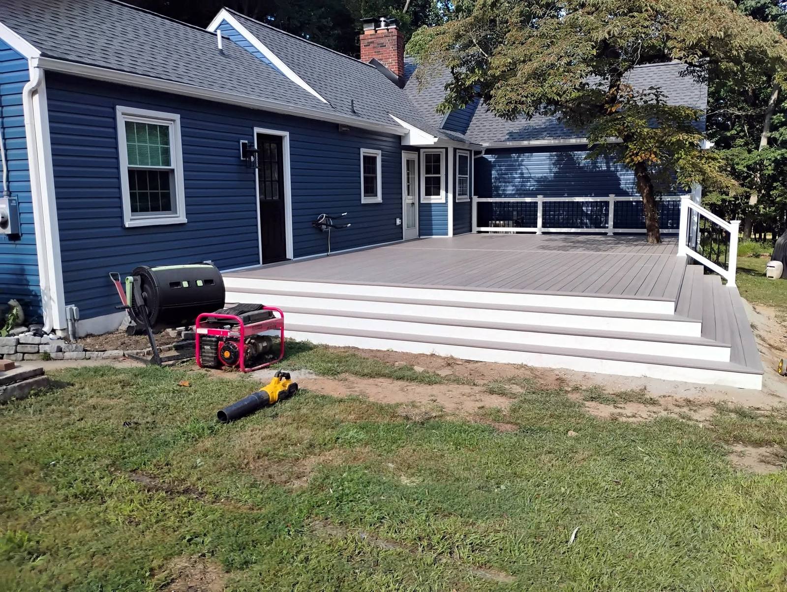 Wide gray platform deck on a blue home