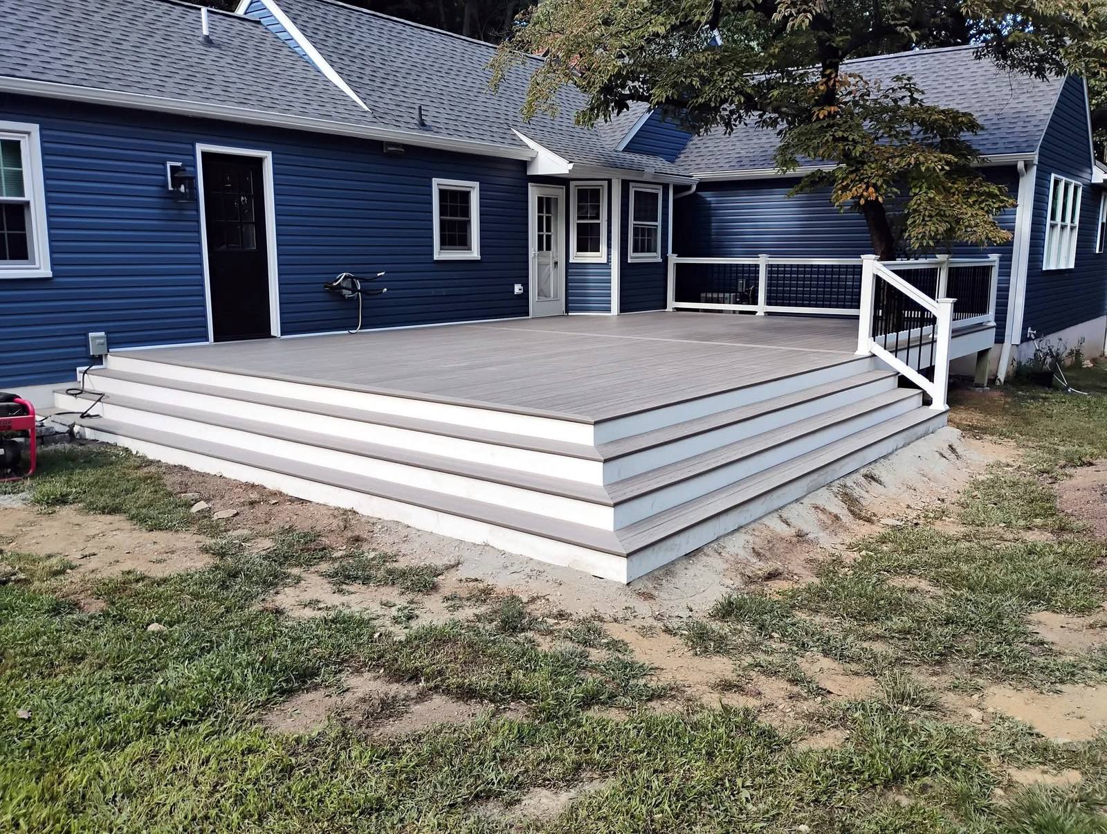 Gray platform deck with broad white steps