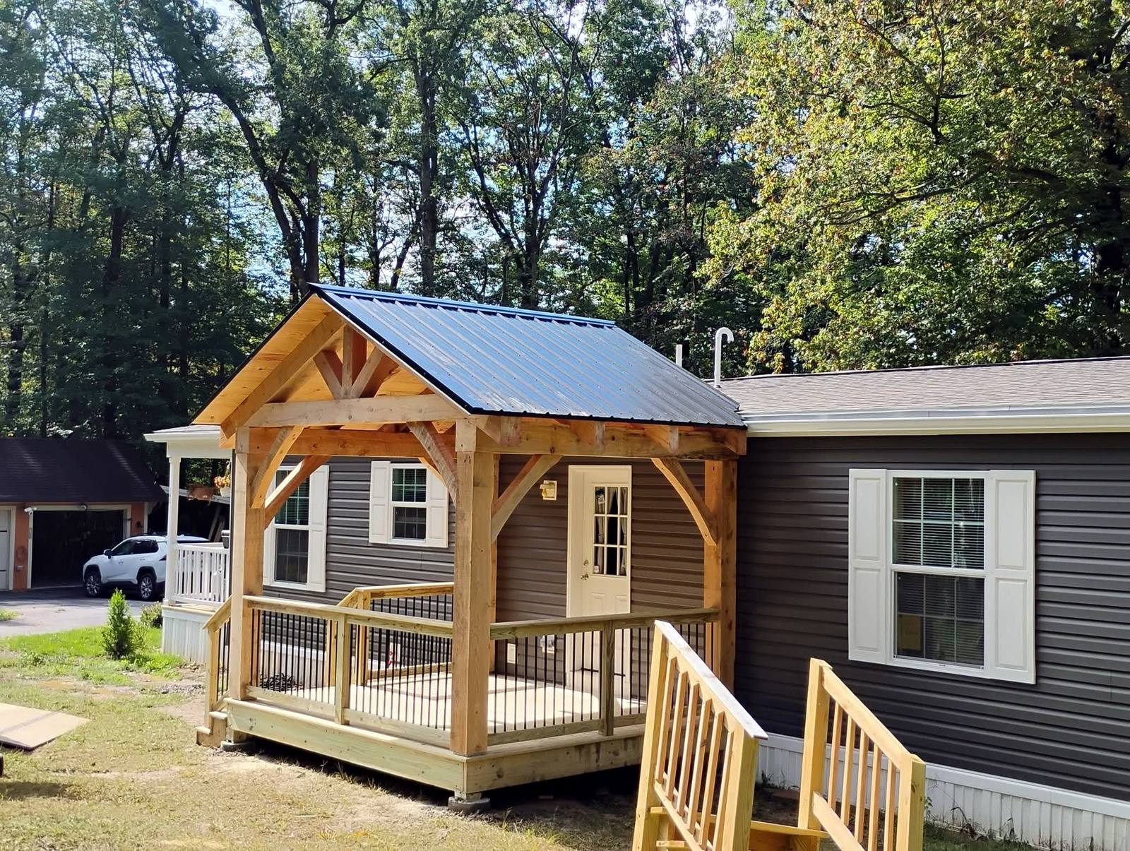 Shingled porch roof and timber trim detail