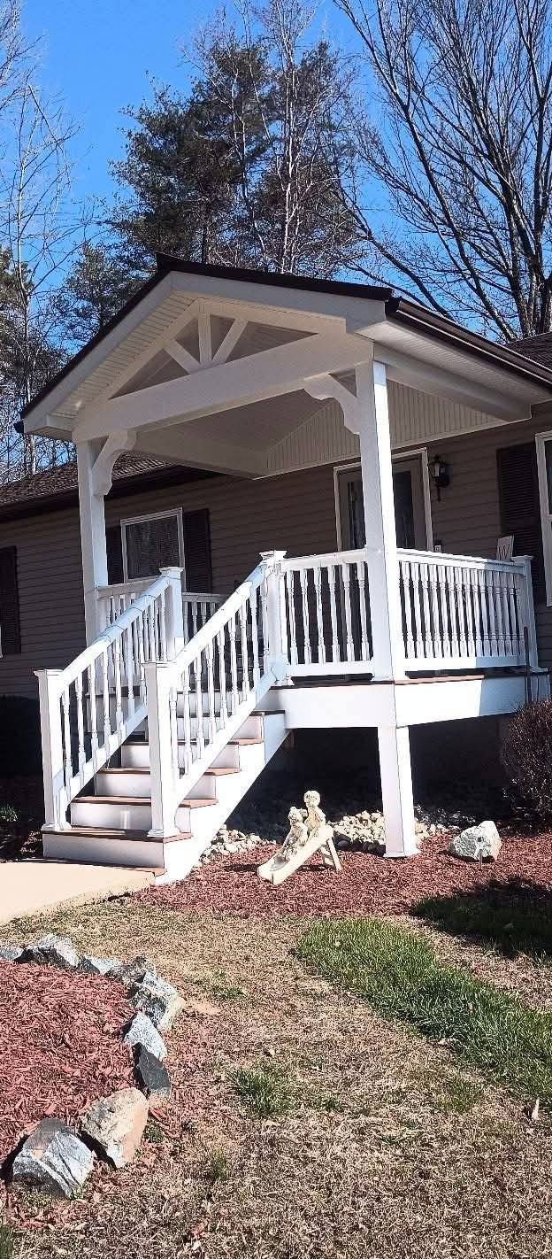 Tall view of a completed exterior porch project
