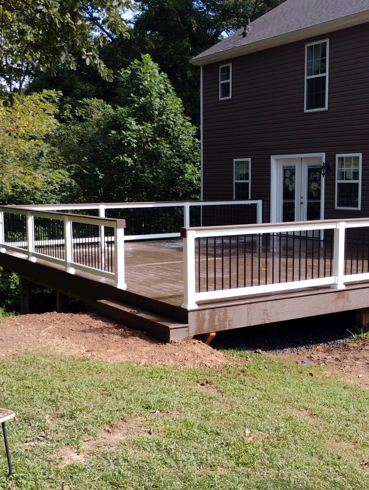 Finished brown deck with dark railings