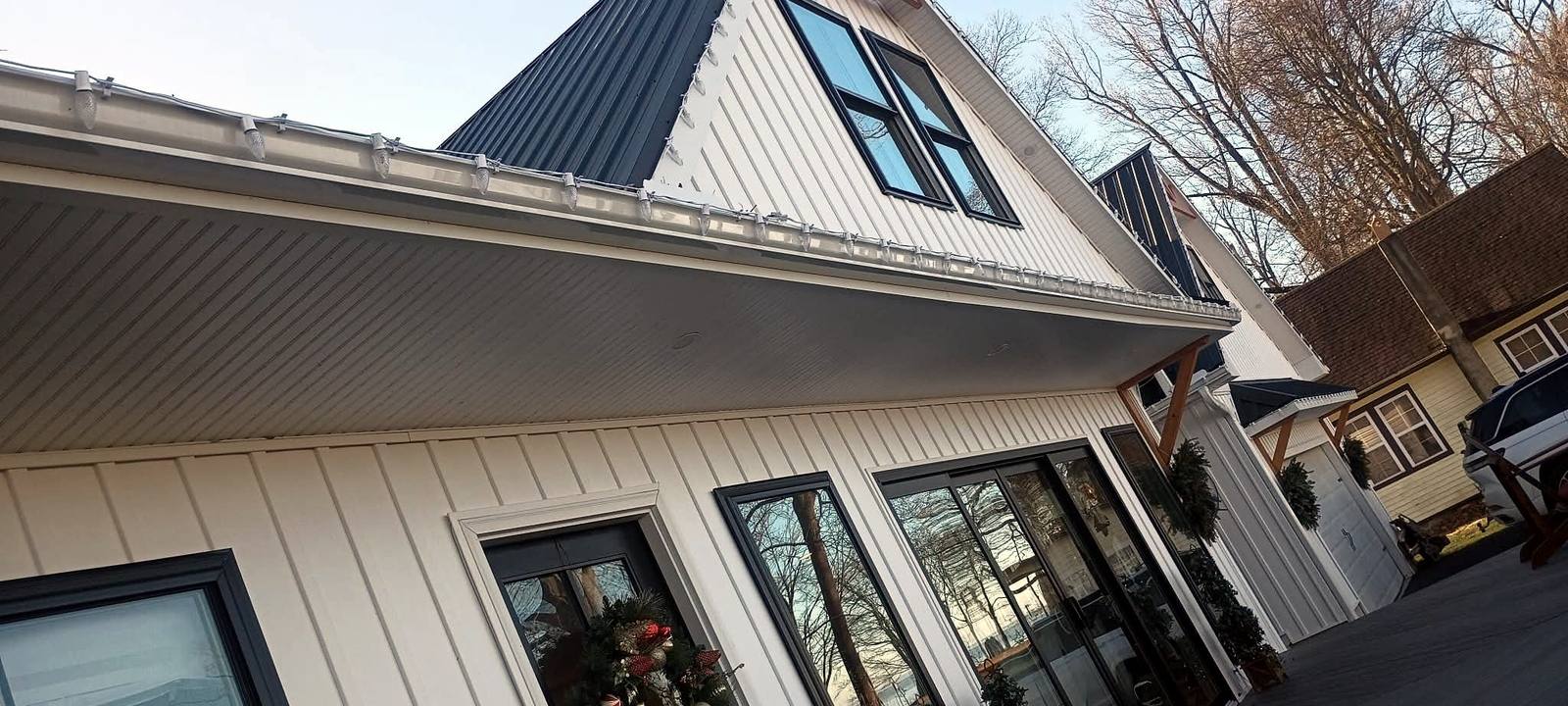 Finished light-colored building exterior and roof
