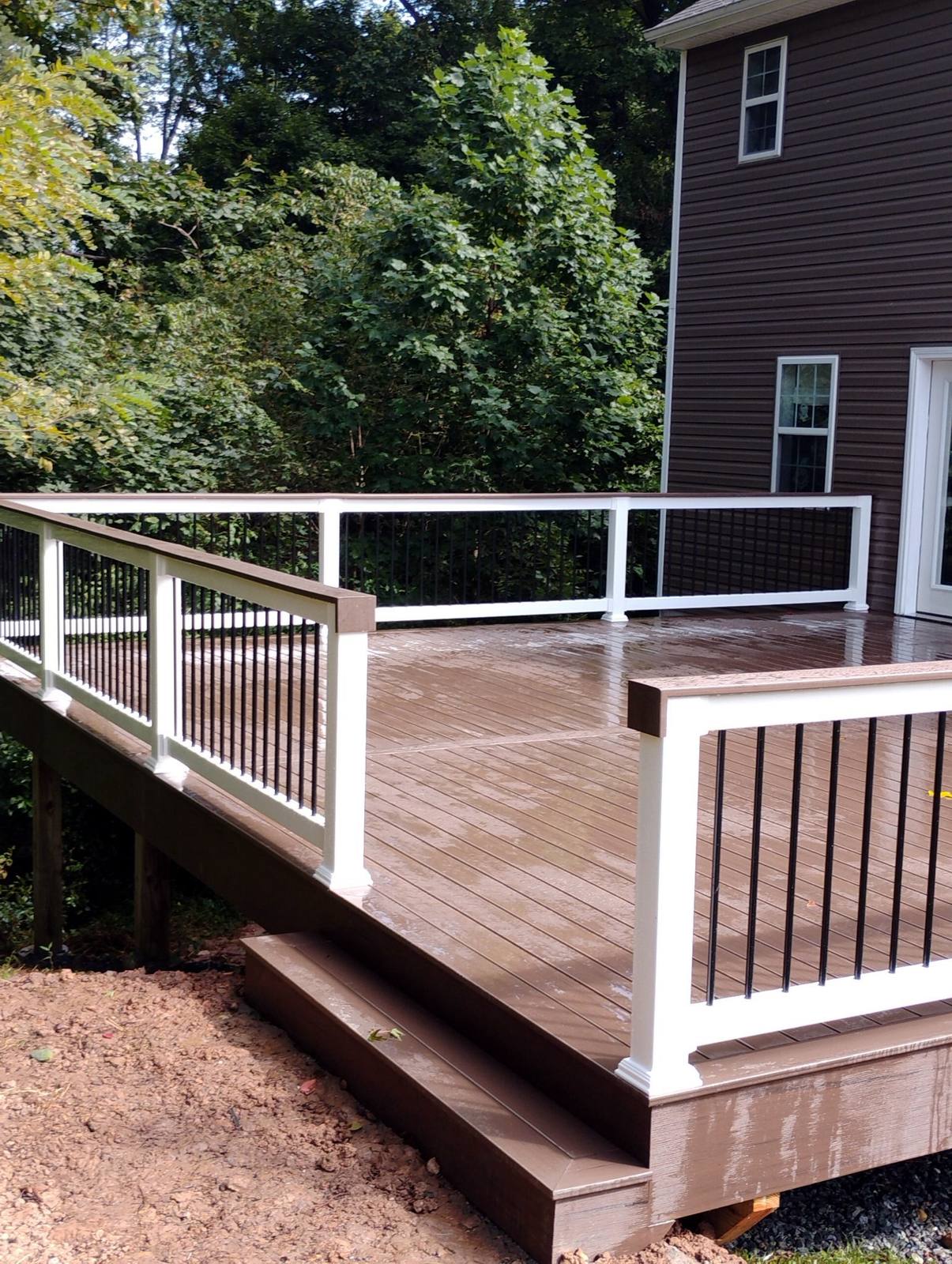 Completed deck and railing viewed from the yard
