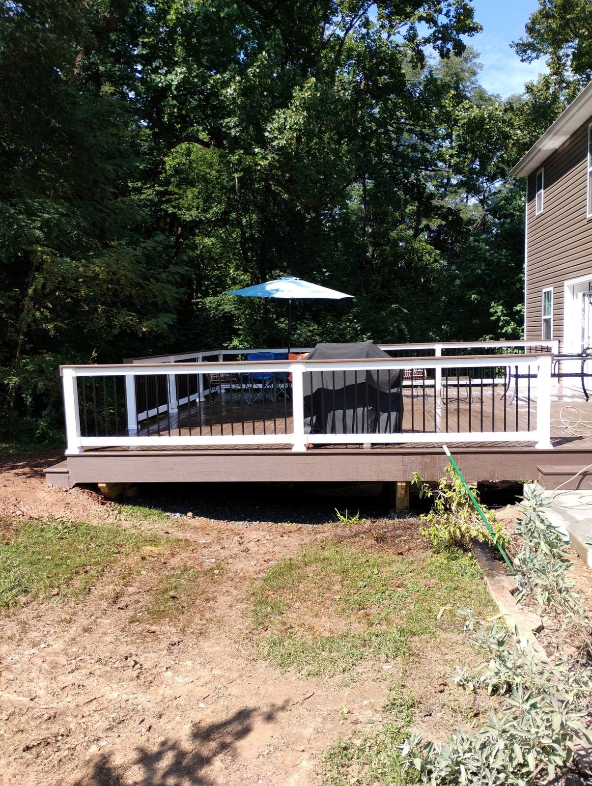 Finished residential deck and yard improvement