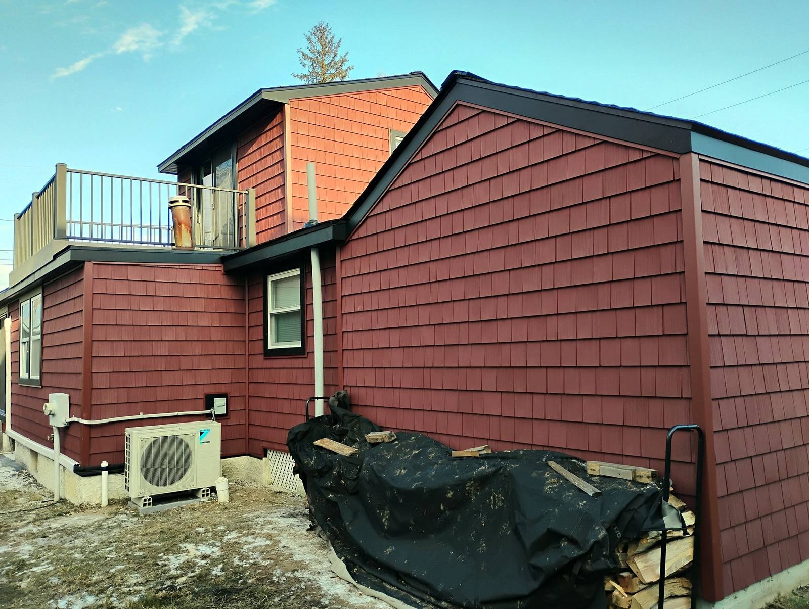 Finished red barn with white trim