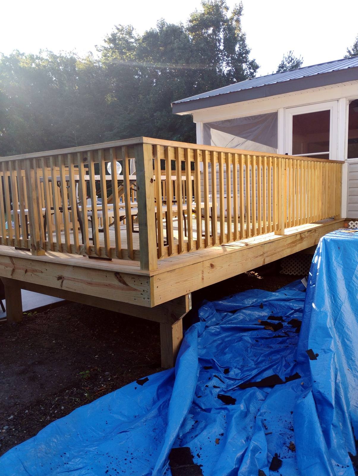 Completed wood deck with broad staircase