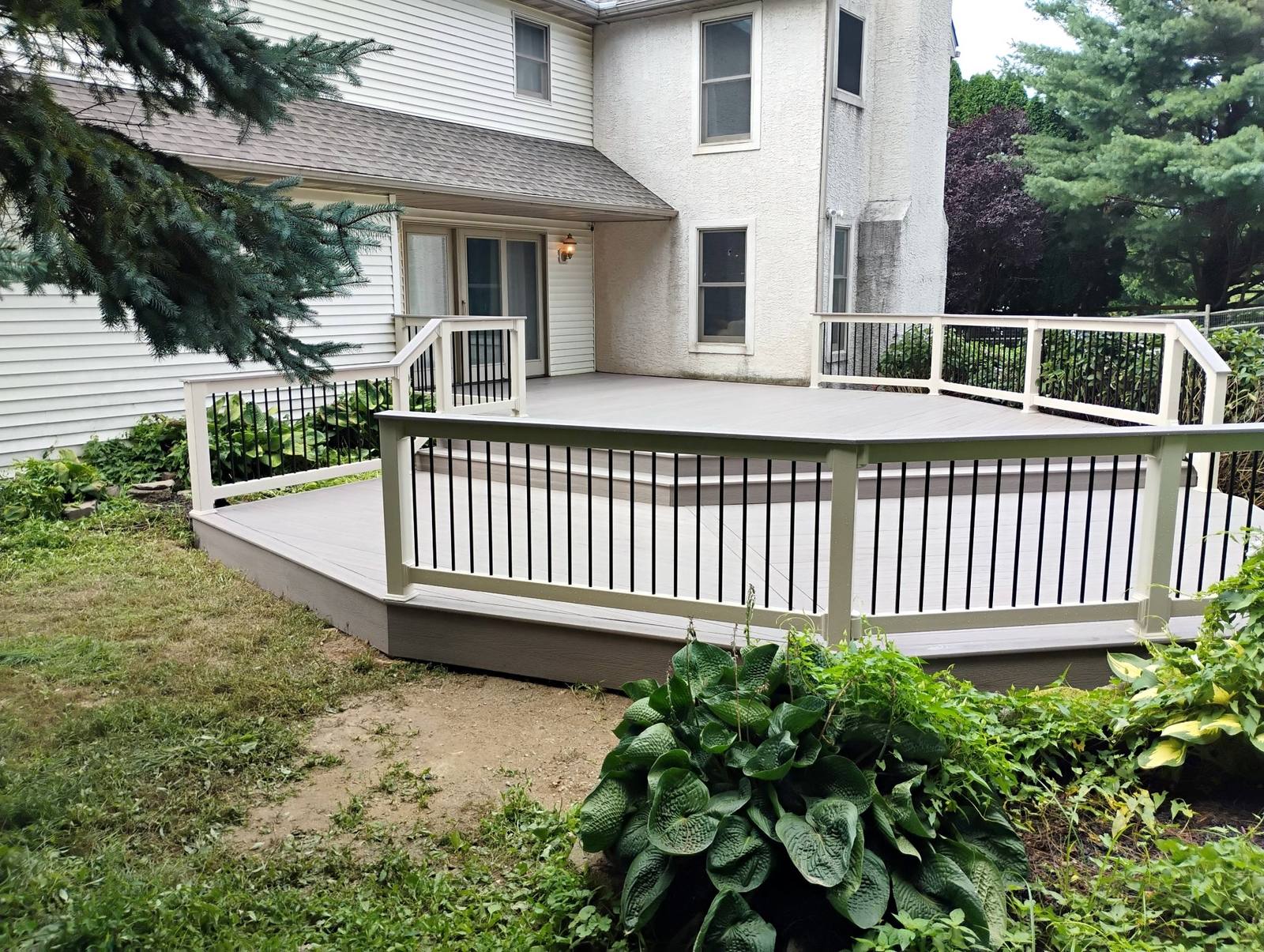 Completed low gray deck with white railings