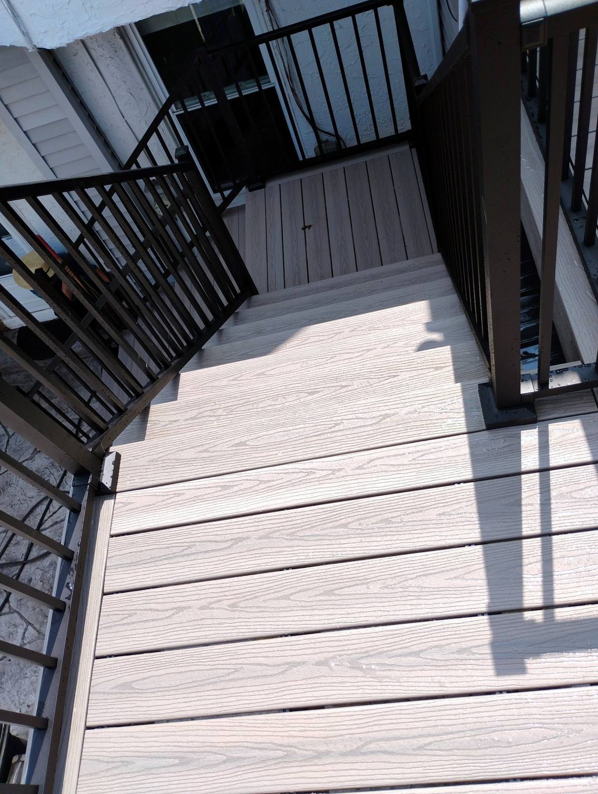 Finished staircase viewed from beneath the elevated deck