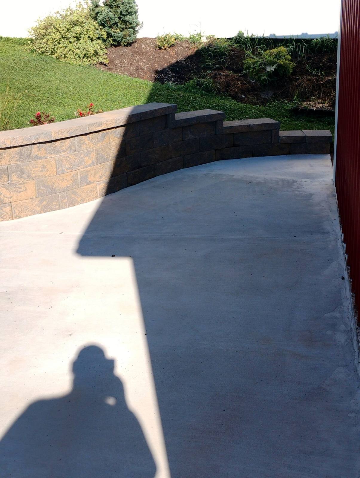 Finished concrete patio behind a home